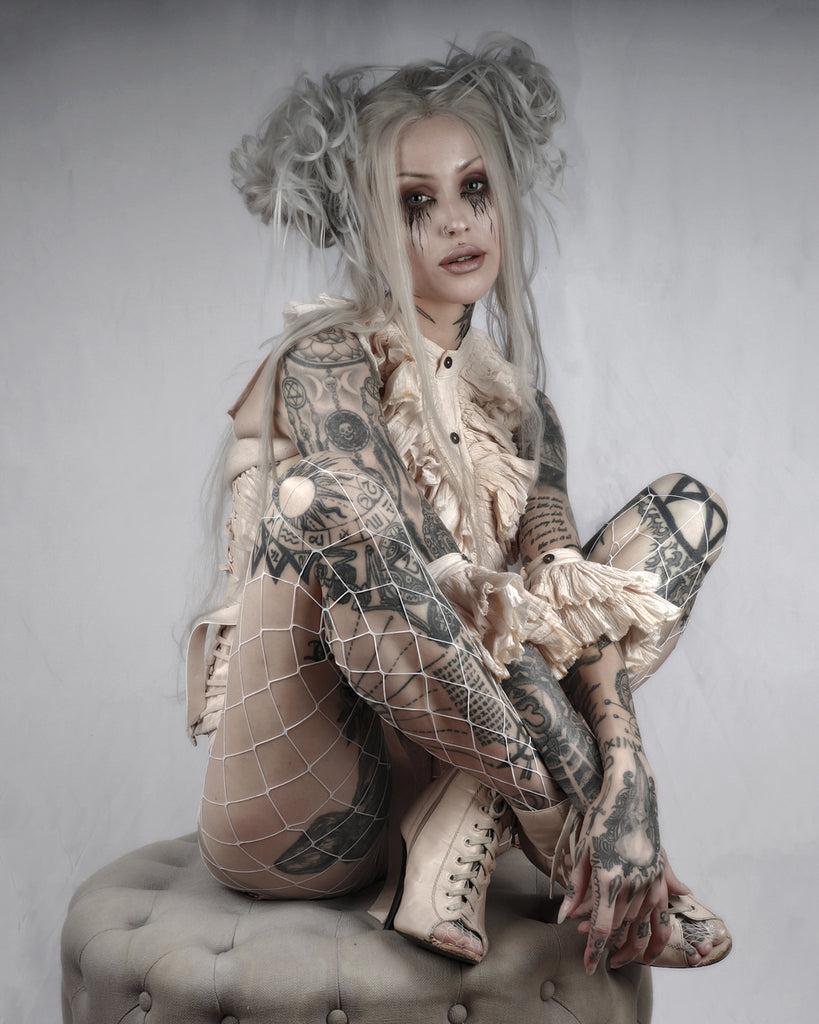 Shelly Dinferno wearing our Dandy Ruffle Collar and Cuffs Set in a tea stained cotton fabric.